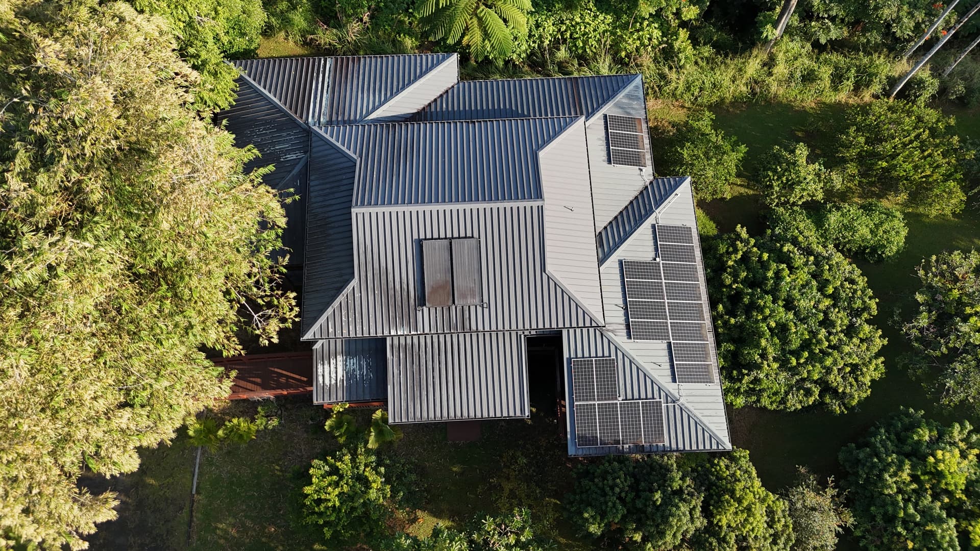 Metal Roof Restoration on a Hawaii Home with Solar Panels image
