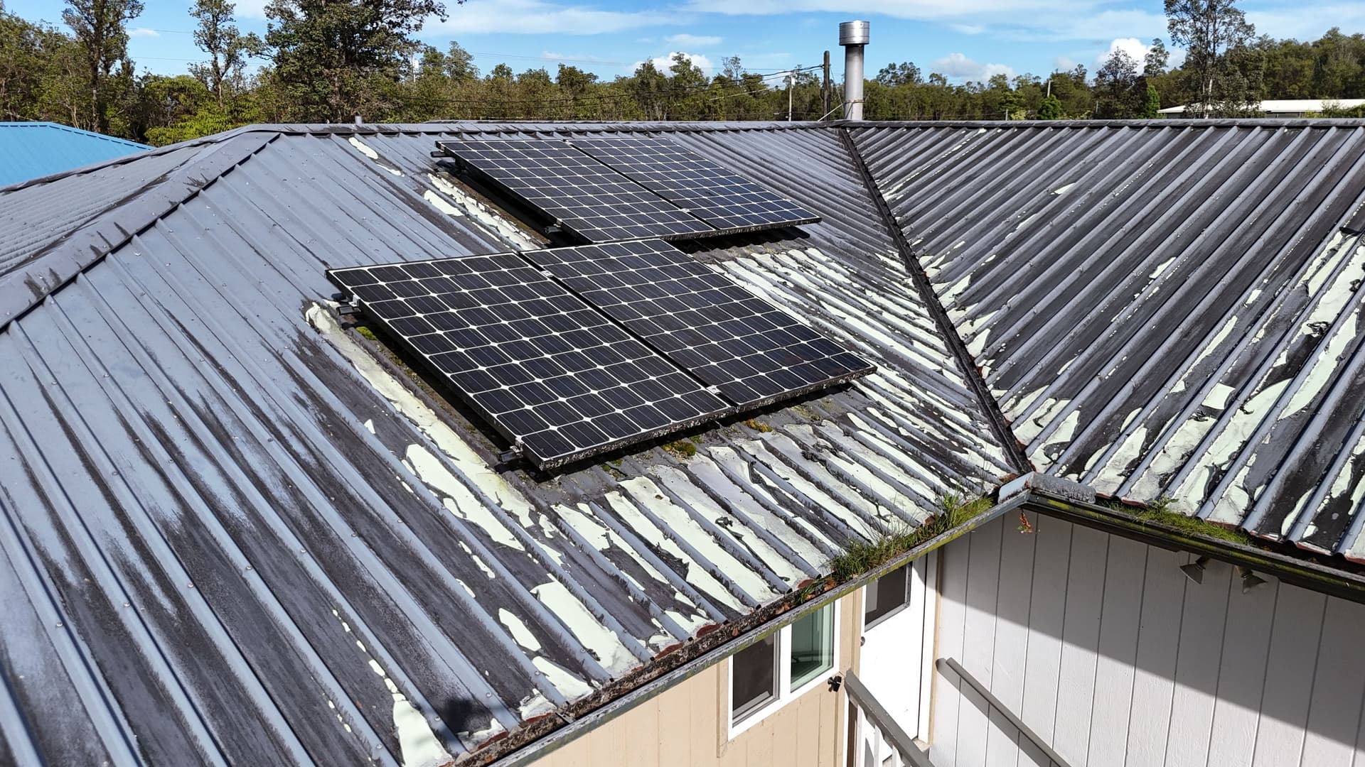 Metal Roof Painting and Gutter Restoration in Mountain View HI image