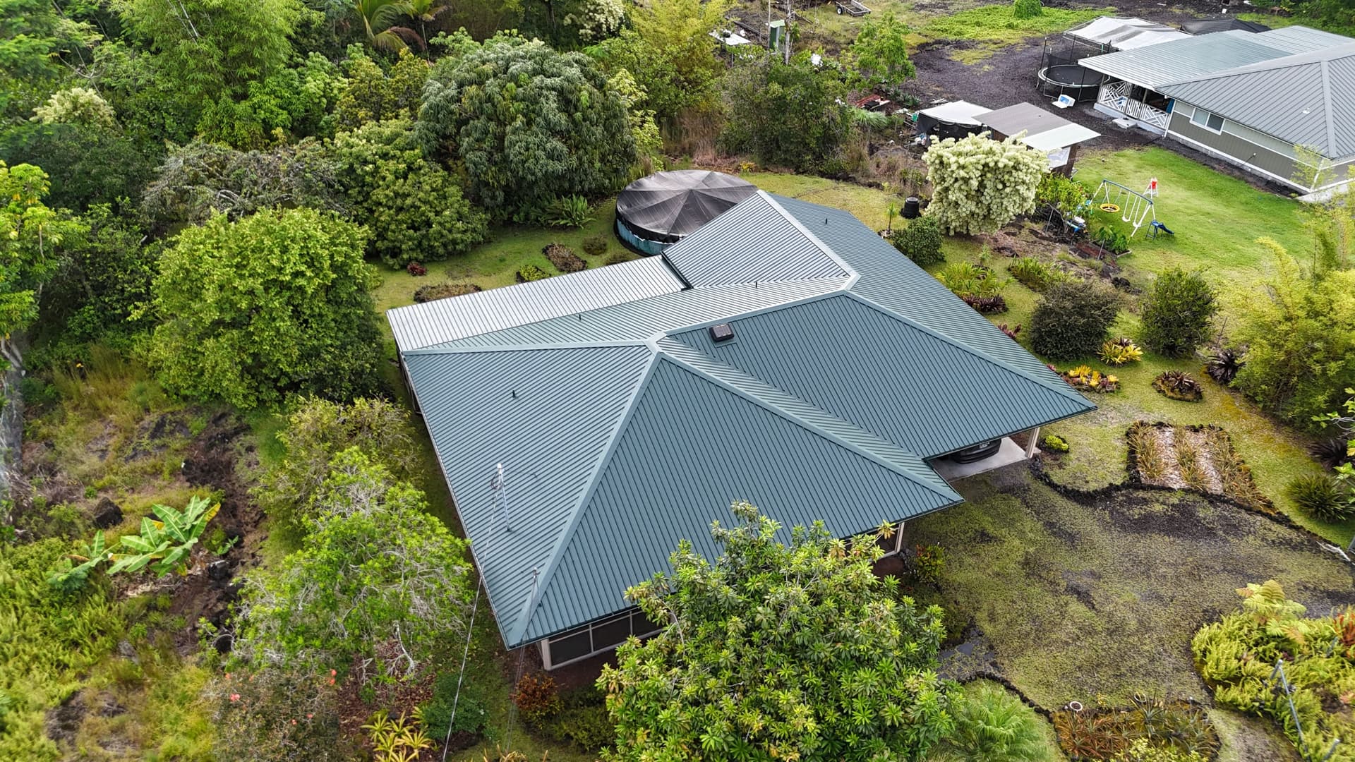 Restoring a Vibrant Green Metal Roof in Hawaiian Paradise Park image